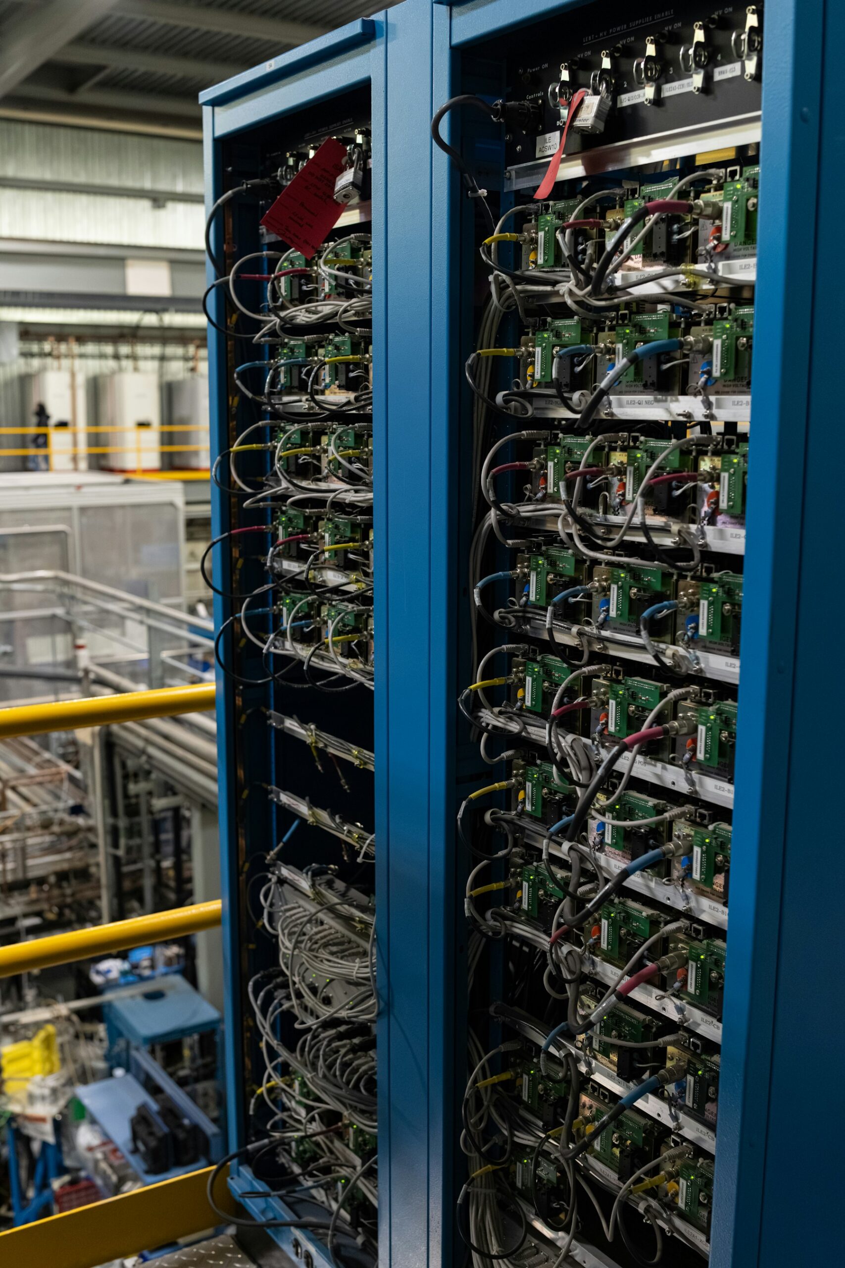 Rows of data center server racks representing artificial intelligence infrastructure and the debate over AI regulation