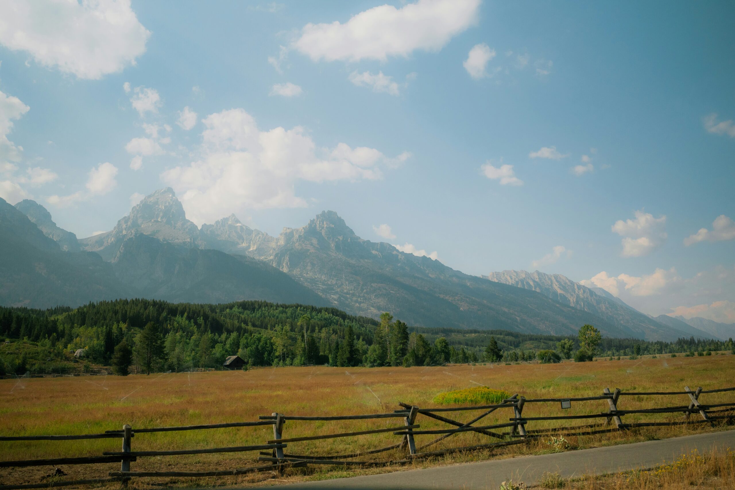 Bright Wyoming mountain landscape illustrating the Wind River dispute over tribal sovereignty and religious freedom