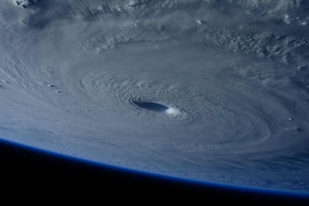 Illustrative satellite photograph of a powerful hurricane swirling over the ocean; not an image of Hurricane Polo or Hurricane Nolo.