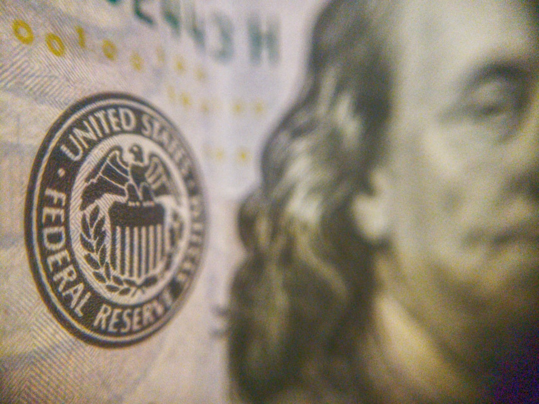 U.S. dollar banknotes illustrating the Federal Reserve interest-rate and inflation outlook