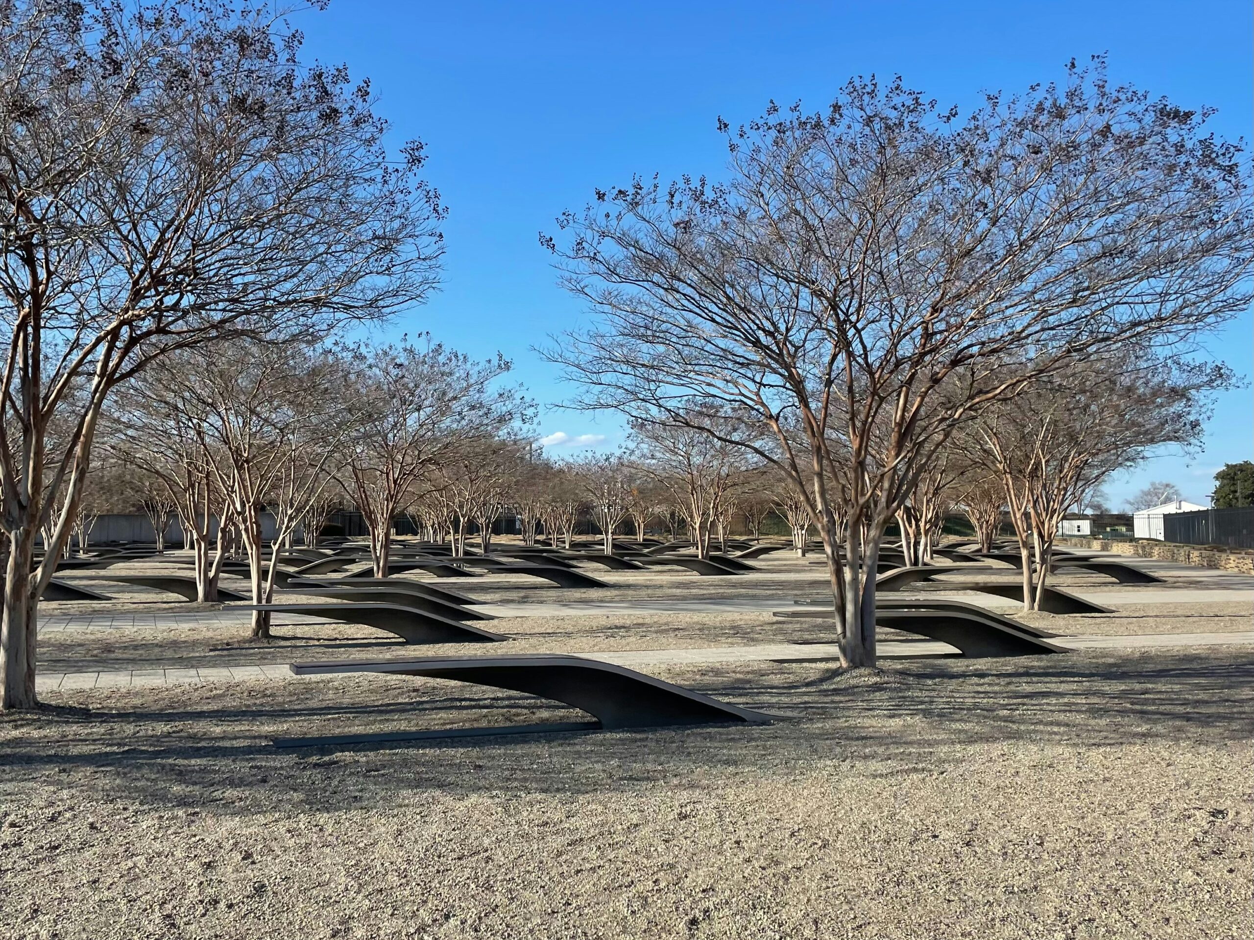 The Pentagon’s landscaped 9/11 Memorial and headquarters exterior in bright daylight
